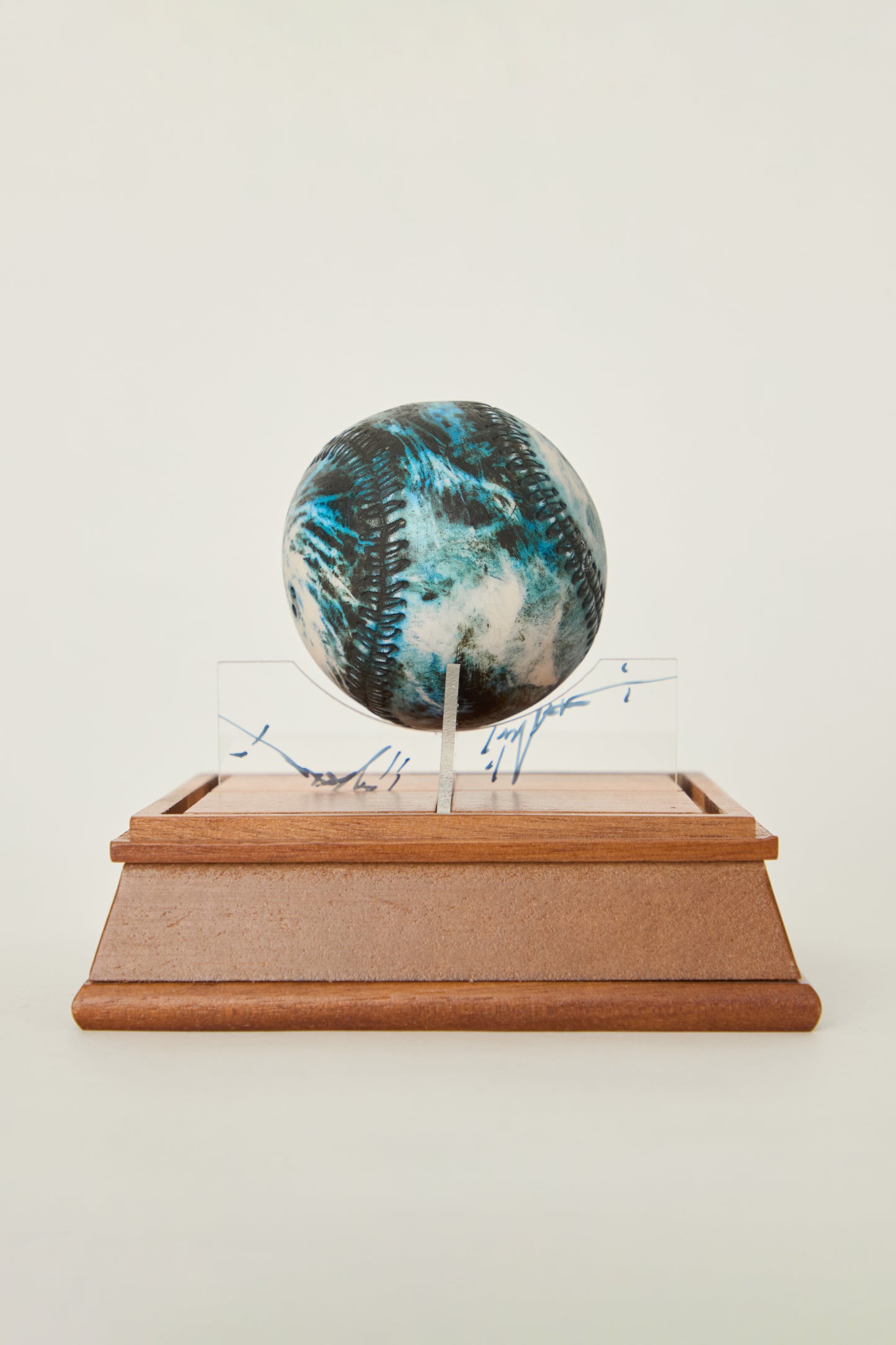 i'm here : Earth :  as a ceramic baseball