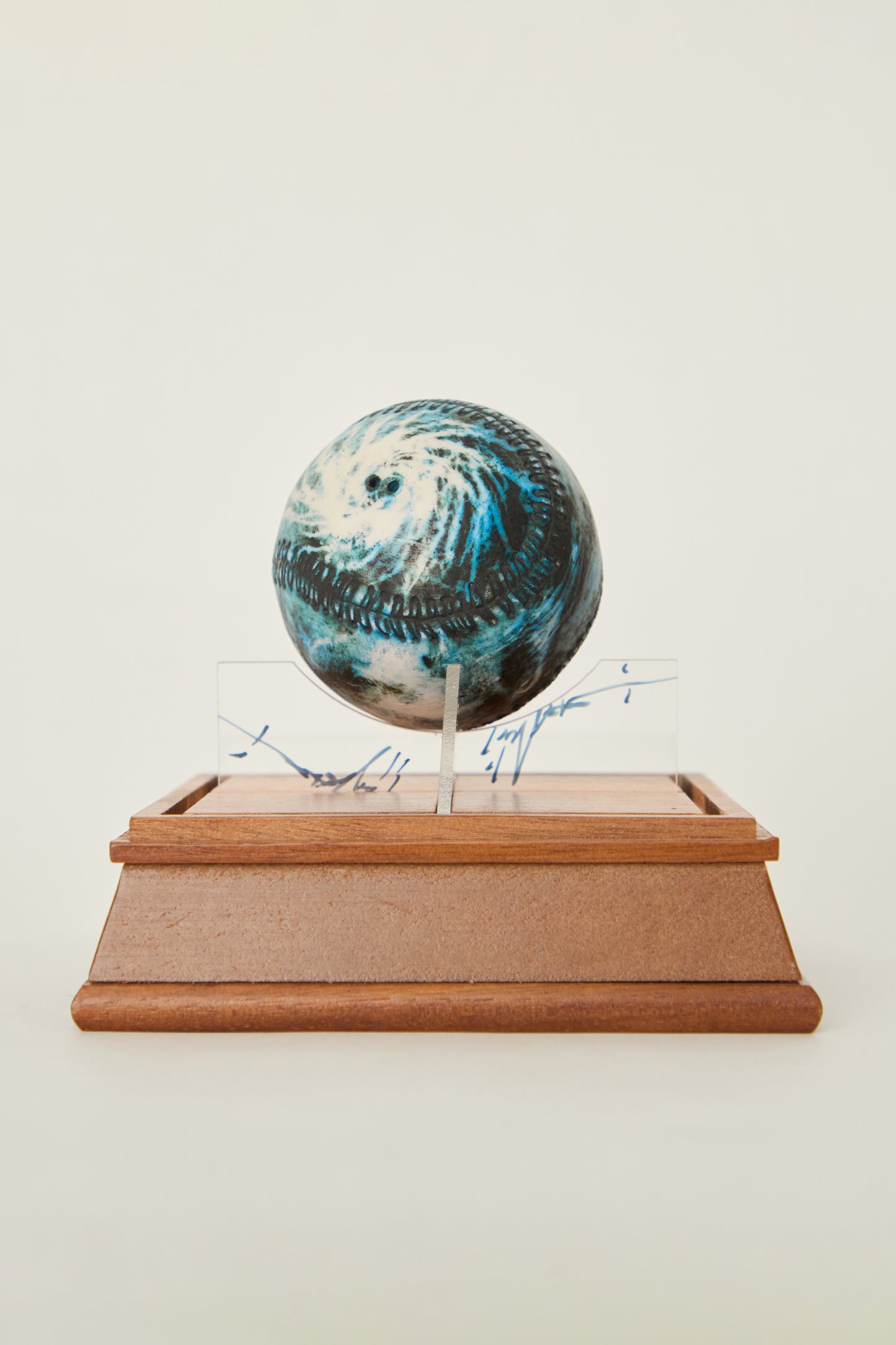 i'm here : Earth :  as a ceramic baseball