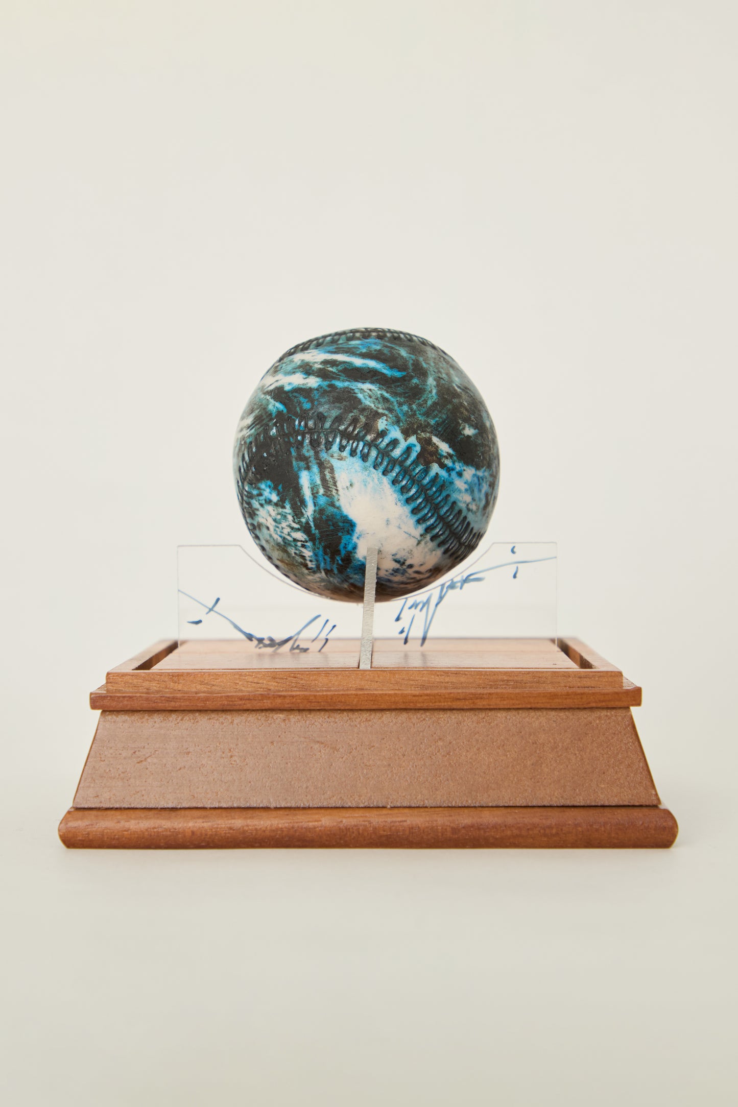 i'm here : Earth :  as a ceramic baseball