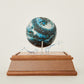 i'm here : Earth :  as a ceramic baseball